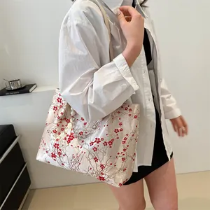 Large jacquard tote bag with red plum blossoms and pearl chain for stylish commuting
