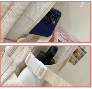 Detail der Rucksack-Seitentasche mit Handy und seitlichem Flaschenhalter mit Schnalle