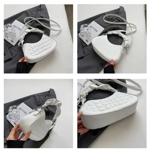 Multi-angle details of white quilted crescent bag with trendy ruched handle and strap