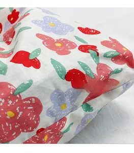 Detail shot of lightweight floral fabric tote with precise stitching and colorful prints