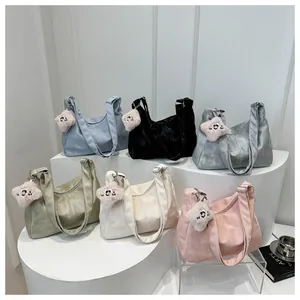 Detailed showcase of high-capacity tote bags in six colors with star plush pendants