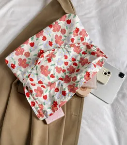 Spacious floral canvas tote bag showing capacity for a tablet and daily essentials