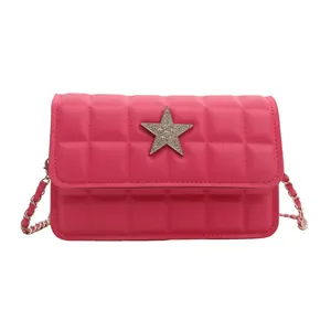 Hot pink quilted square crossbody bag featuring a silver rhinestone star and chain strap