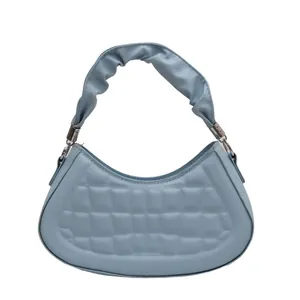 Light blue quilted crescent handbag with ruched handle and silver metal hardware