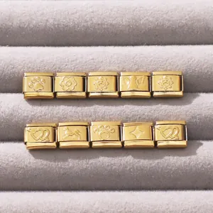 Bracciali componibili italiani in acciaio inossidabile dorato con simboli incisi