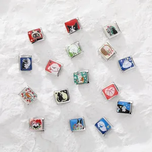 Detailed close-up of colorful enamel pet and floral charms for Italian link bracelets