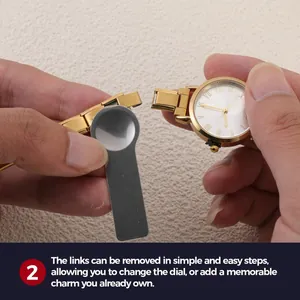 Removing links from a gold vintage modular watch strap using a silver metal tool