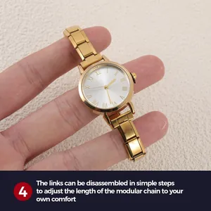 Detail of gold quartz watch featuring modular chain links for easy length adjustment