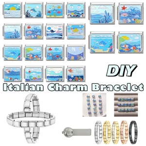 Macro view of ocean-themed DIY Italian charms featuring waves and shells on steel base