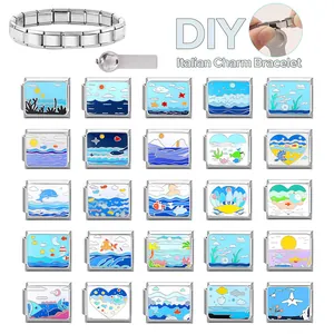 Detail of Italian charm bracelet links featuring ocean-themed colorful enamel patterns