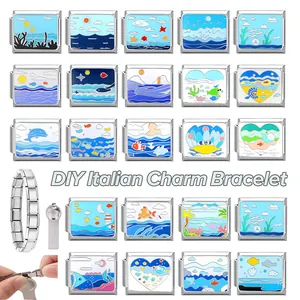 Macro view of ocean-themed DIY Italian charm bracelet links and assembly tool