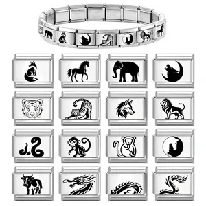 Modulaire roestvrijstalen schakelarmband met diverse vintage dierensilhouet bedeltjes