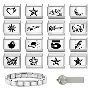 Macro view of modular stainless steel charms with laser engravings and Italian bracelet links