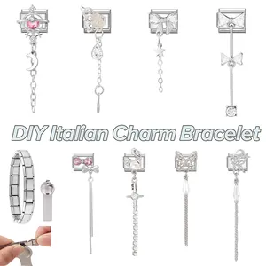 Detailed view of DIY Italian charm bracelet links with silver star and moon pendants