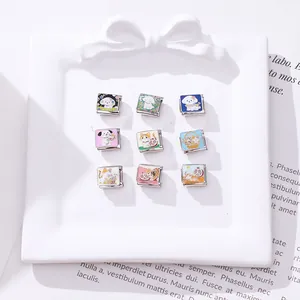 Flat lay of 9 cute cartoon pet Italian charms on a white plate with a vintage magazine backdrop