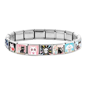 Close-up of stainless steel charms bracelet with colorful cartoon cat and dog illustrations