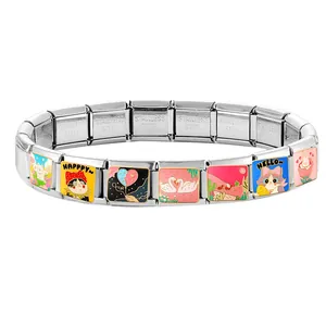 Close-up of Italian charm bracelet links with colorful enamel cartoon cat and heart patterns