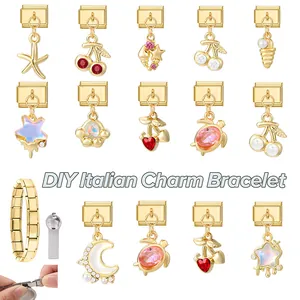 Macro view of modular gold Italian charm bracelet with various DIY jewelry pendants