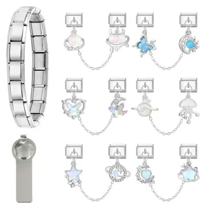 Macro detail of Italian modular charm bracelet showing stainless steel base and tool