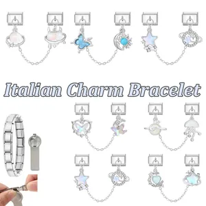 Italian charm bracelet components with planet, heart, and butterfly charms in blue tones