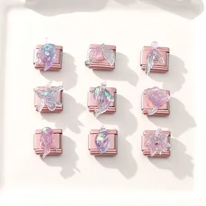 Macro shot of 9 pink Italian charm modules featuring ocean glitter resin sea animals