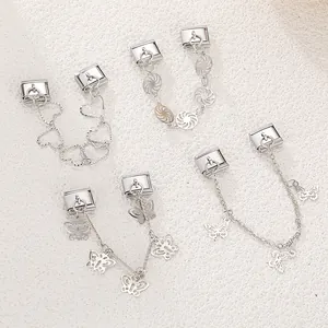 Detail von DIY Italian Charms mit hohlem Herz und Schmetterlingsanhängern für Armbänder