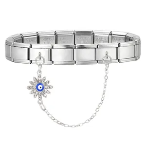 Detail of Italian modular bracelet with Evil Eye sun charm and stainless steel engraving