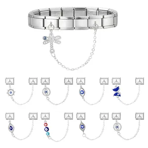 Italian charm bracelet in stainless steel featuring evil eye charms and dragonfly pendants