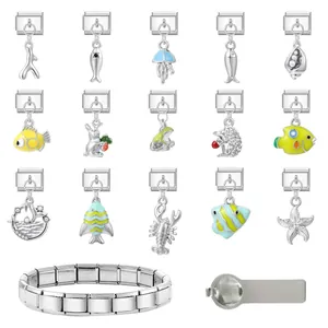 Dettaglio di 14 charm italiani con animali marini e strumenti per bracciali DIY