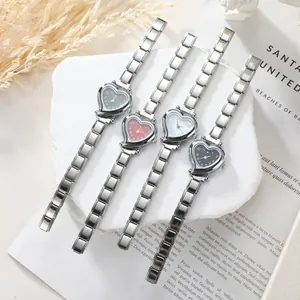 Women heart-shaped quartz watches with silver stretch bands in four classic colors