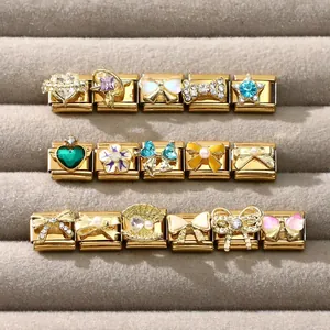 Detailed selection of gold Italian charm links with colorful enamel and crystal inlays