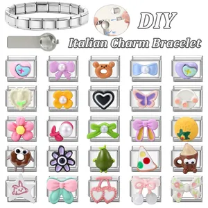 Detail view of 25 cute stainless steel Italian charms and a link bracelet for DIY jewelry