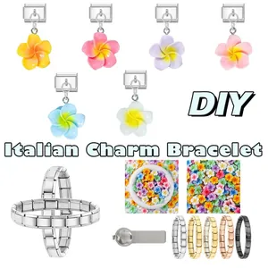 Detailed view of colorful enamel plumeria charms on Italian stainless steel links