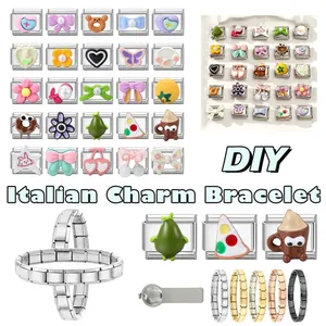 Macro shot of stainless steel Italian charm bracelet links with colorful enamel patterns