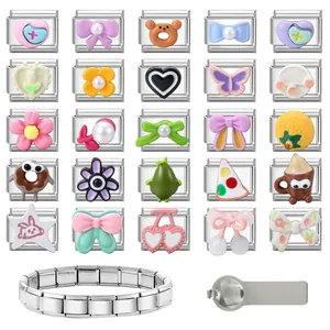 Detailed view of DIY Italian charms with stainless steel base and colorful enamel patterns