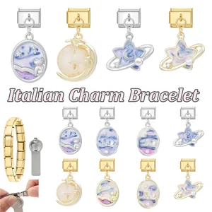 Macro detail of Italian charm bracelet links featuring moon and cat enamel pendants