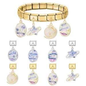 Italian style gold stainless steel charm bracelet with star and moon themed pendants