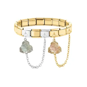 Detail of Italian modular bracelet with dual rose pendants and stainless steel engraving