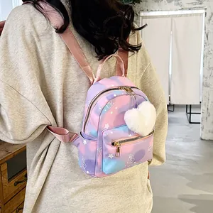 Mini nylon backpack detail with gradient pastel colors and star heart prints on back