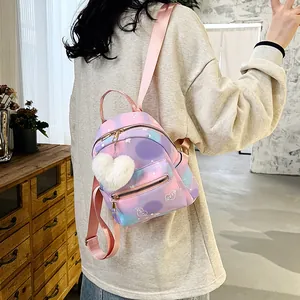 Mini nylon backpack with pastel gradient heart prints and heart plush keychain