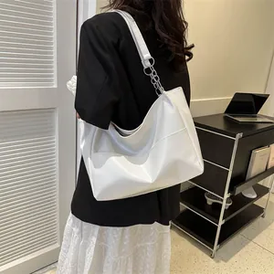 Minimalist large capacity white tote bag with silver chain strap for casual daily use