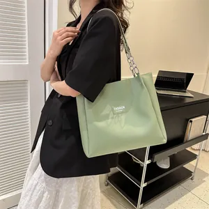 Light green large capacity tote bag with fashion instinct patch and chain strap