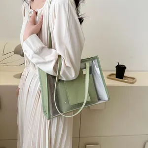 Minimalist light green transparent PVC tote bag with inner pouch and shoulder handles