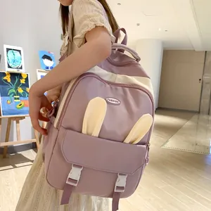 Detail of lavender and cream backpack with cute rabbit ears and fashion buckle design