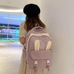 Cute lavender school backpack with bunny ears for students large capacity casual rucksack