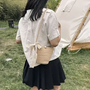 Sac seau en paille tressée avec nœud en dentelle et perle pour mode d'été