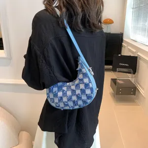 Stylish blue checkered crescent underarm bag for women with frayed edge design details
