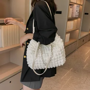 White large puff texture tote bag with pearl chain handle and long shoulder strap