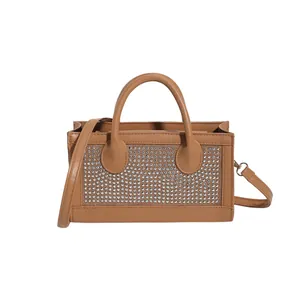 Brown rhinestone rectangular handbag with top handles and adjustable shoulder strap