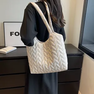 White chevron quilted oversized tote bag with plush texture for casual commuting use